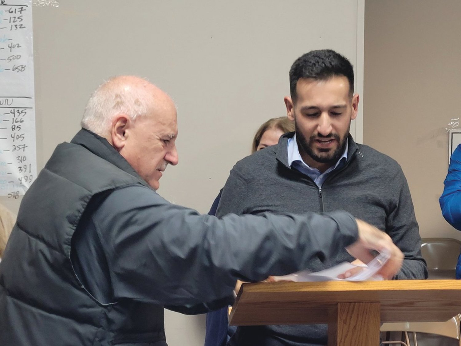 MAYORAL LEGACY: In tears, now outgoing Johnston Mayor Joseph Polisena passed the lectern to his son, Mayor-elect Joe Polisena Jr. after General Election night’s victory was clear.